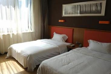 בית מלון כפרי 7days Premium Qinhuangdao Railway Station Yingbin Road