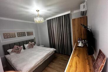 Отель Qassaq Mini