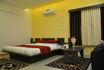 Отель Om Executive