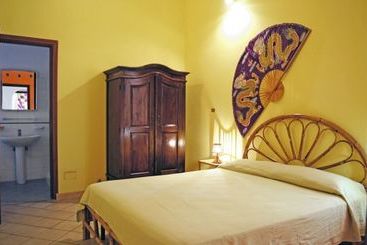 Апартаменты I Dammusi Di Punta Karace