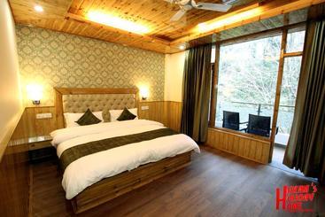 호텔 Hukam S Holiday Home Kasol