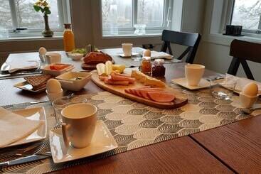 تختخواب و صبحانه Den Sovande älgen