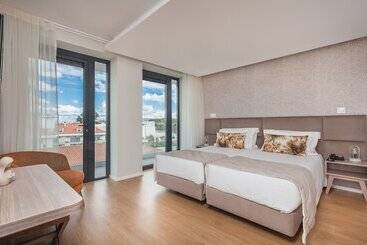 호텔 Essence Inn Marianos