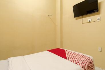 Capital O 615 Residence Puri Hotel Syariah