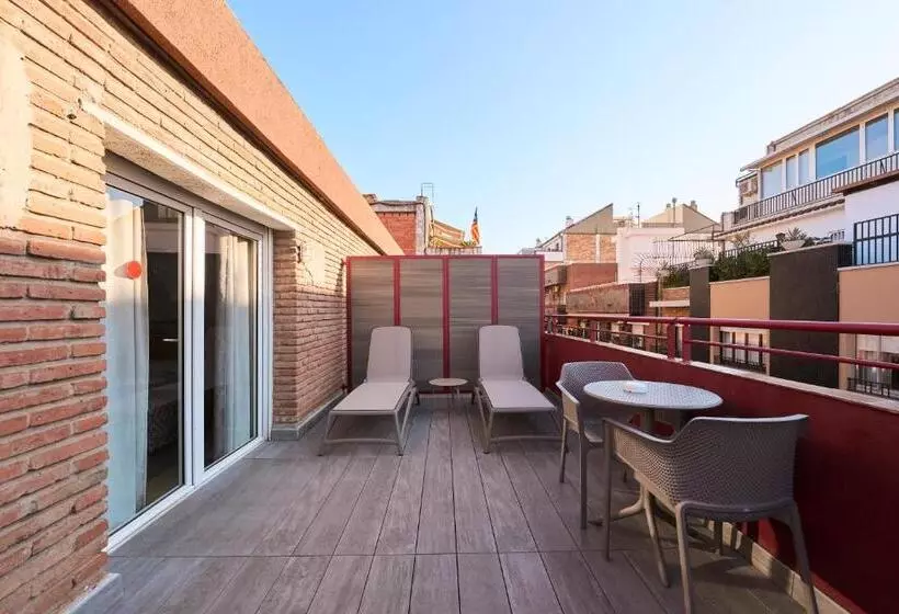 Отель Catalonia Park Guell