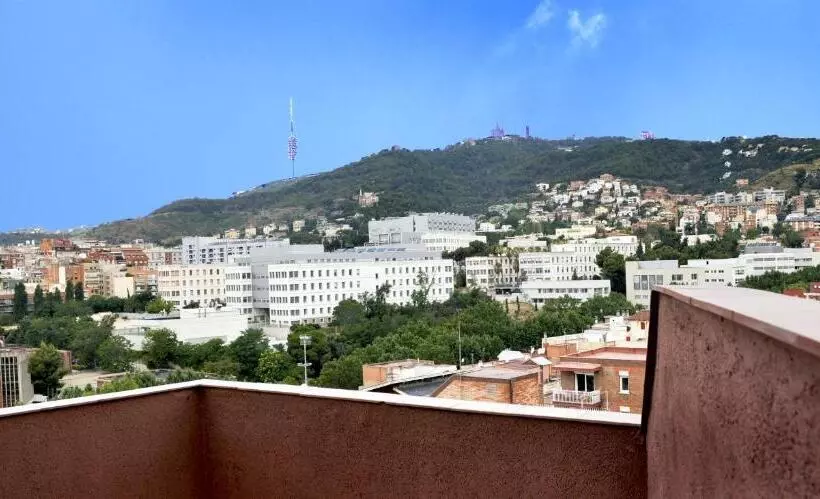 Отель Catalonia Park Guell