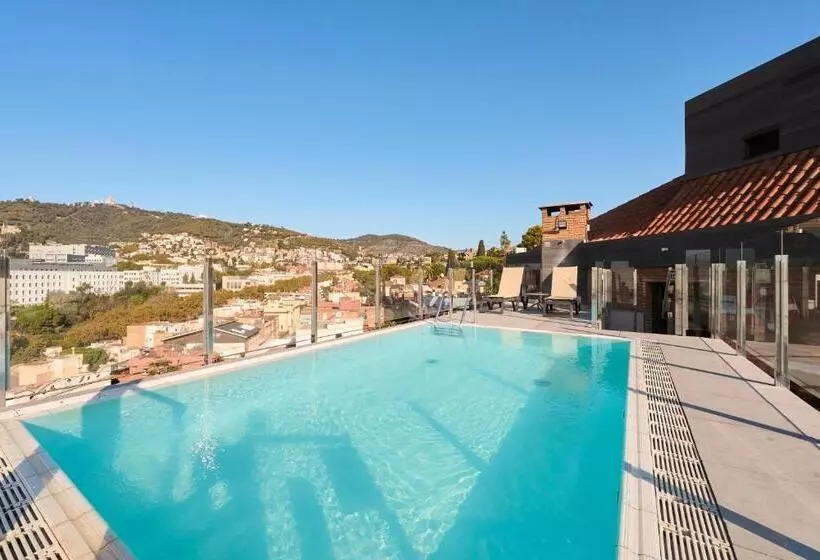 Отель Catalonia Park Guell