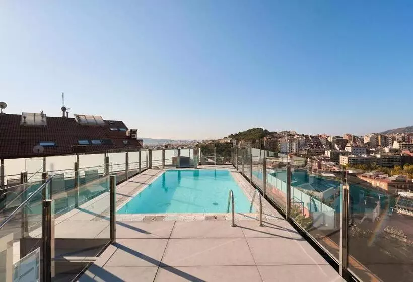 Отель Catalonia Park Guell