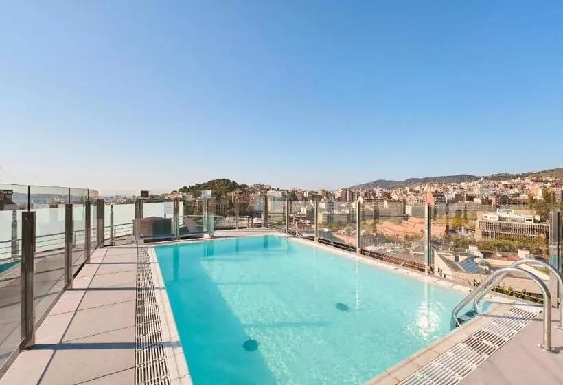 Отель Catalonia Park Guell