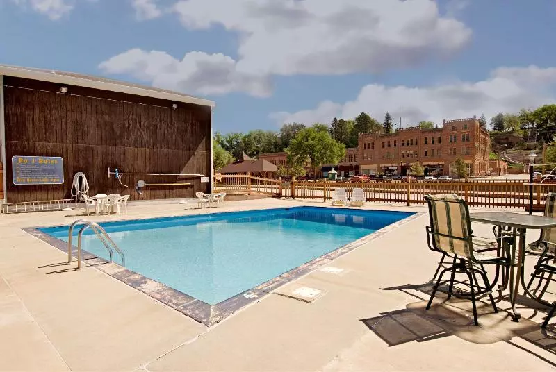 בית מלון כפרי Americas Best Value Inn By The River Hot Springs