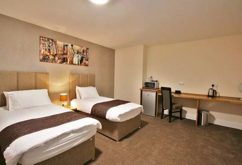New County Hotel & Serviced Apartments By Roomsbooked
