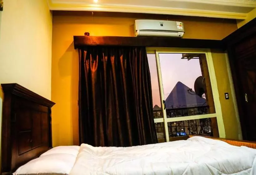 تختخواب و صبحانه Happy Days Pyramids Inn