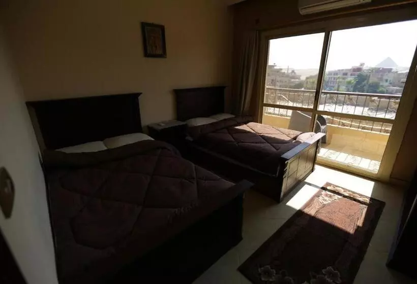 تختخواب و صبحانه Happy Days Pyramids Inn