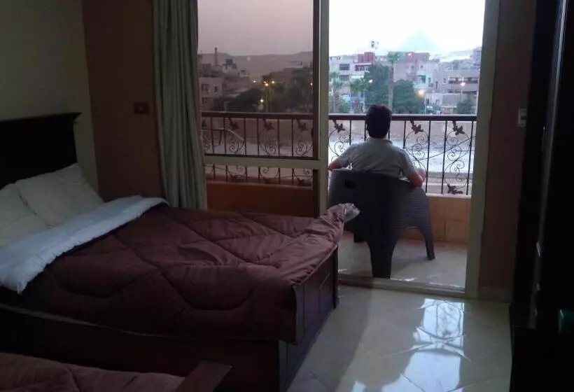 تختخواب و صبحانه Happy Days Pyramids Inn