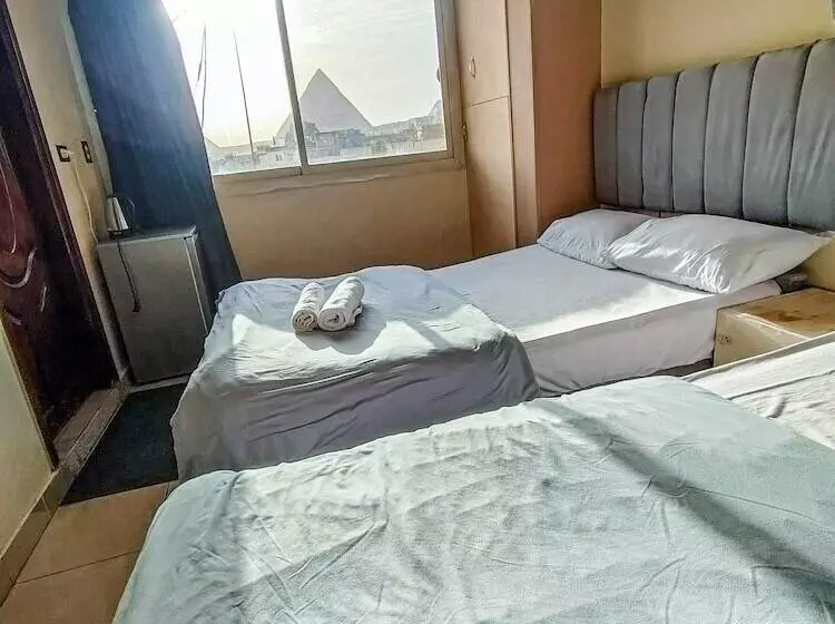 تختخواب و صبحانه Happy Days Pyramids Inn