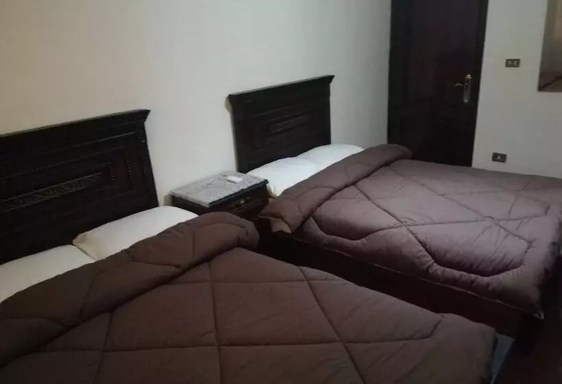 تختخواب و صبحانه Happy Days Pyramids Inn
