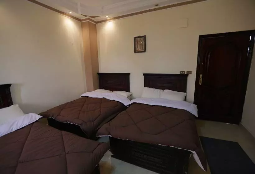 تختخواب و صبحانه Happy Days Pyramids Inn