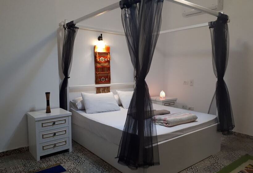 هتل Arabian Nights Pyramids Guesthouse