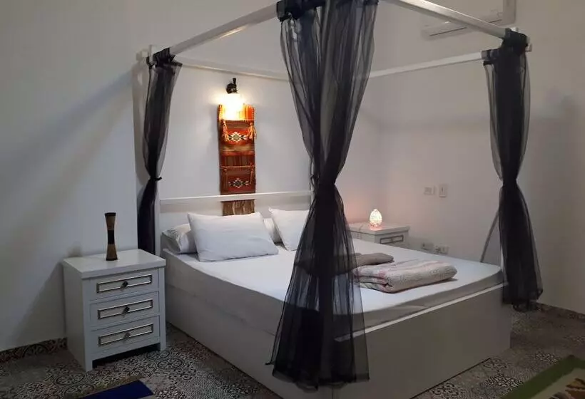 هتل Arabian Nights Pyramids Guesthouse