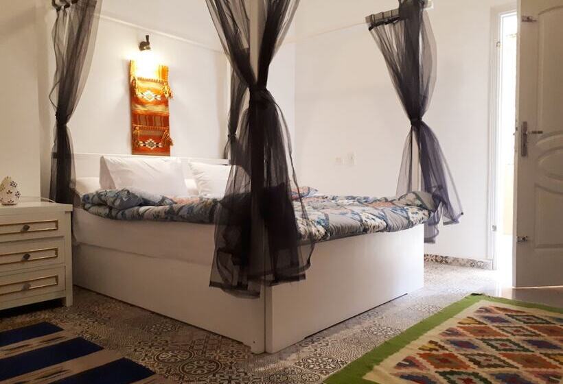 هتل Arabian Nights Pyramids Guesthouse