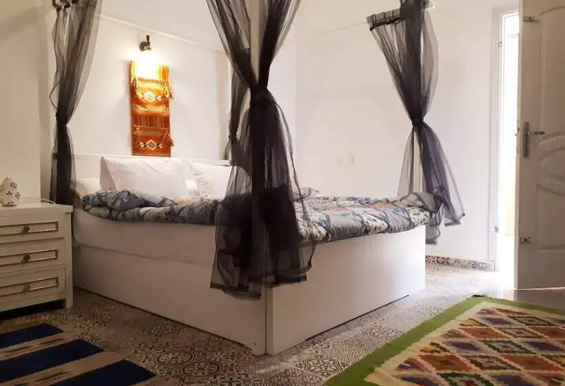 هتل Arabian Nights Pyramids Guesthouse