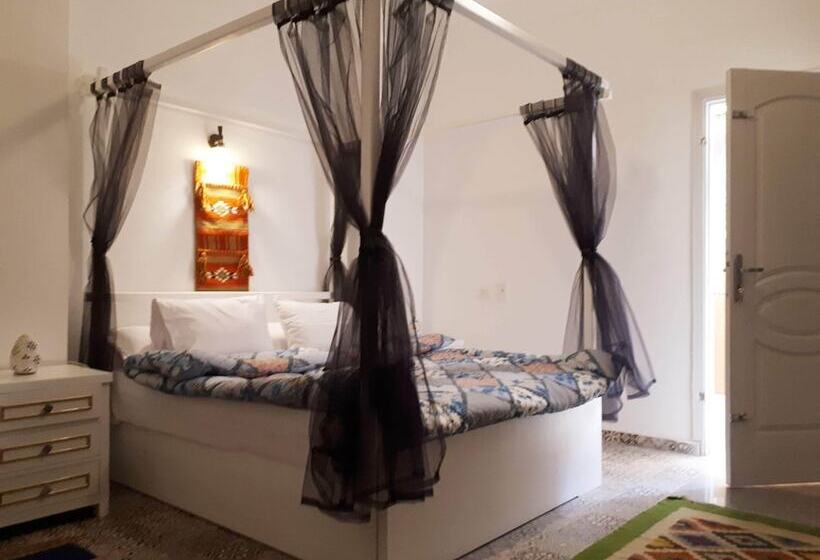 هتل Arabian Nights Pyramids Guesthouse