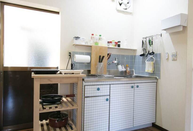 بنسيون Uzushio Guest House