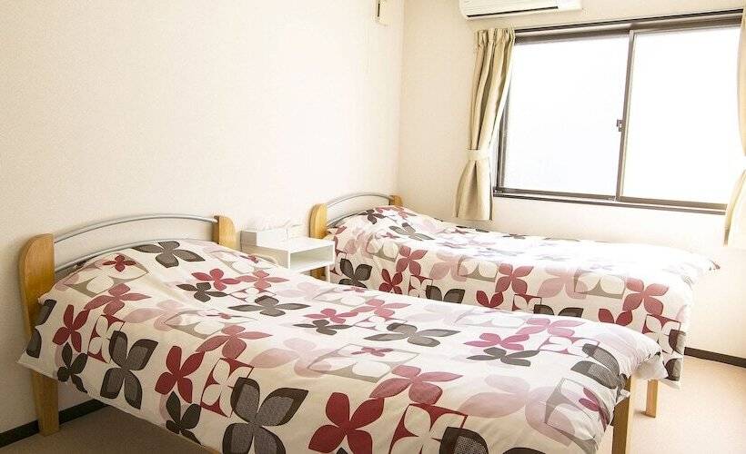 بنسيون Uzushio Guest House