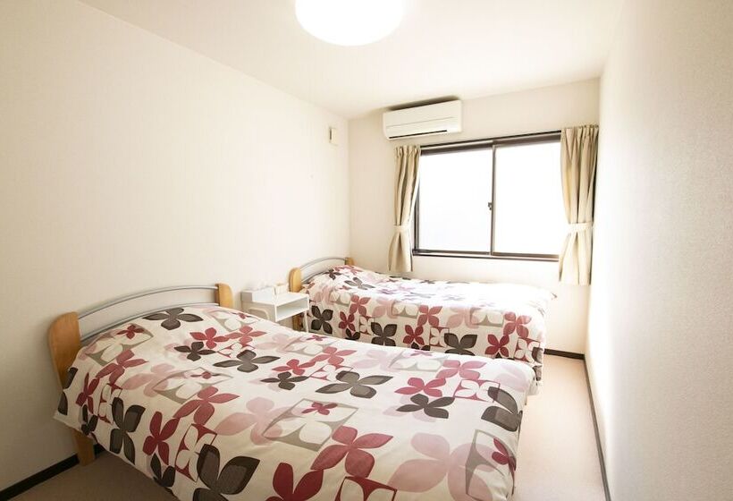 بنسيون Uzushio Guest House