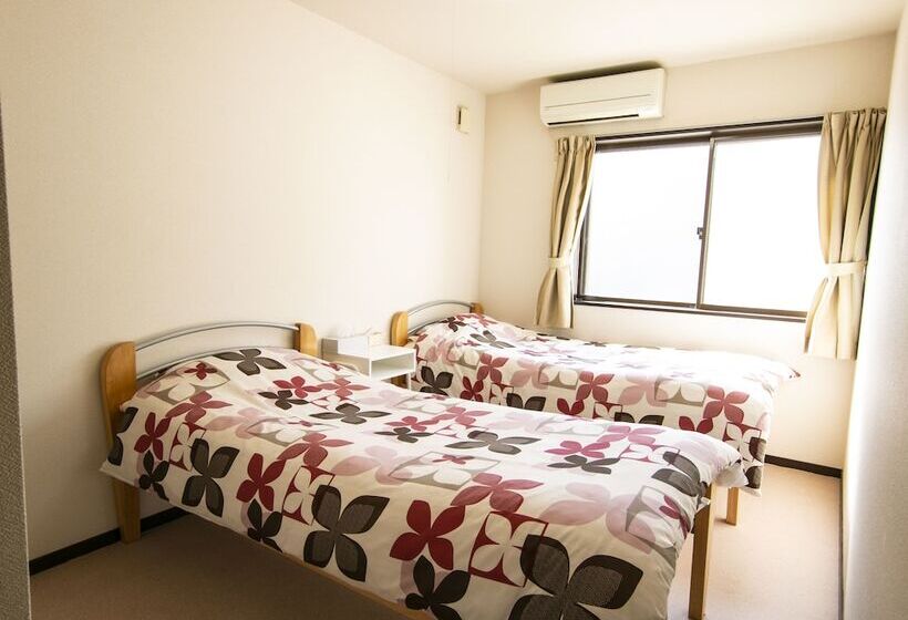 بنسيون Uzushio Guest House