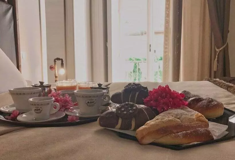 تختخواب و صبحانه Duomo Luxury Suites