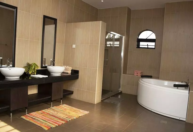 تختخواب و صبحانه The Hive Entebbe Guesthouse
