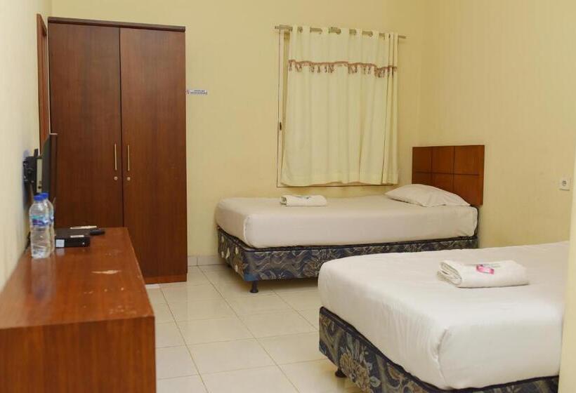 פנסיון Al Ghani Syariah Mitra Reddoorz