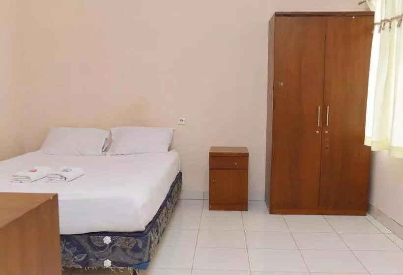 ペンション Al Ghani Syariah Mitra Reddoorz