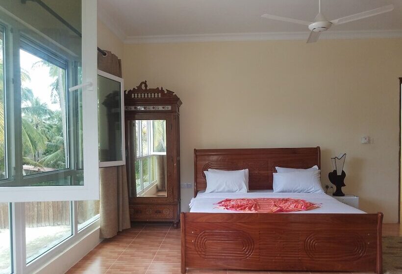 פנסיון Bwejuu Beach Palm Villa