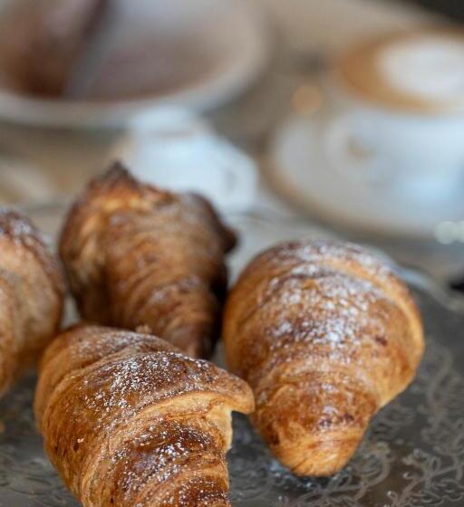 Pension (Hôtel basse catégorie) Compasso Suites