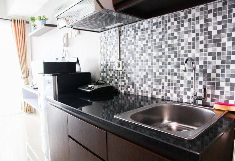 Fabulous Studio Grand Dhika City Apartment By Travelio