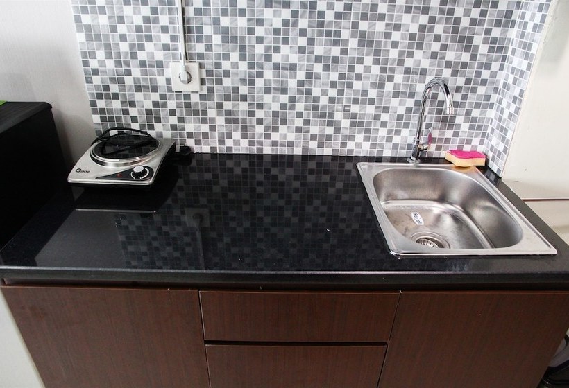 Fabulous Studio Grand Dhika City Apartment By Travelio