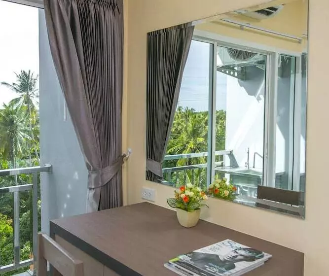 ホテル Thawan Apartment