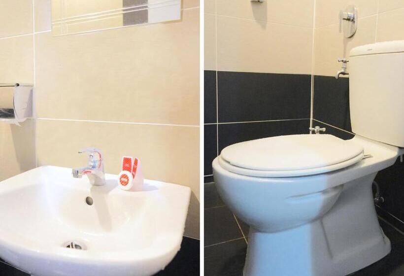 בית מלון כפרי Utama Inn By Oyo Rooms