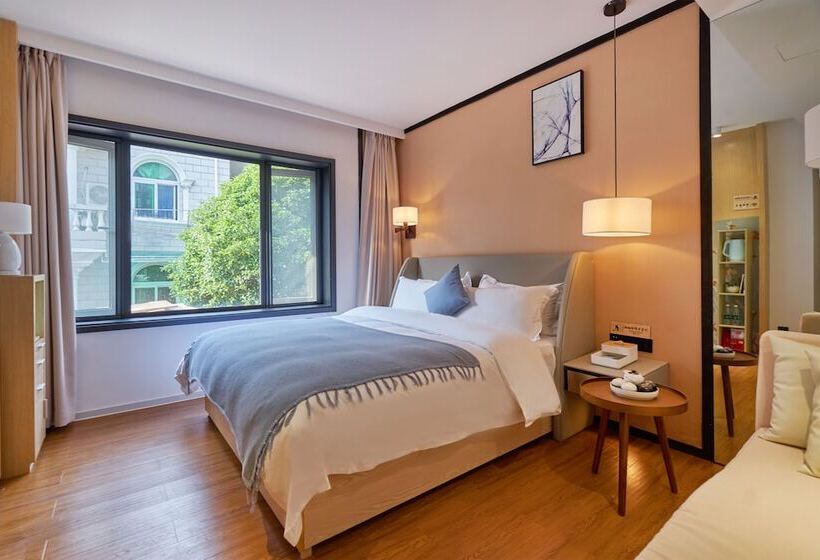 هتل Wuhua Xingxiang Shanfang