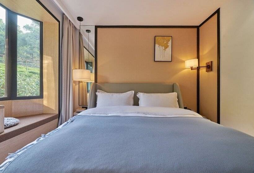 هتل Wuhua Xingxiang Shanfang