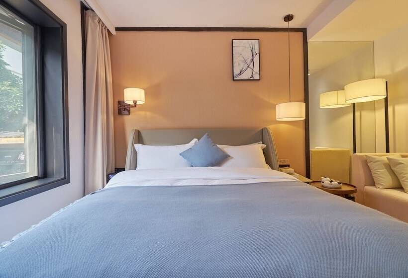 هتل Wuhua Xingxiang Shanfang