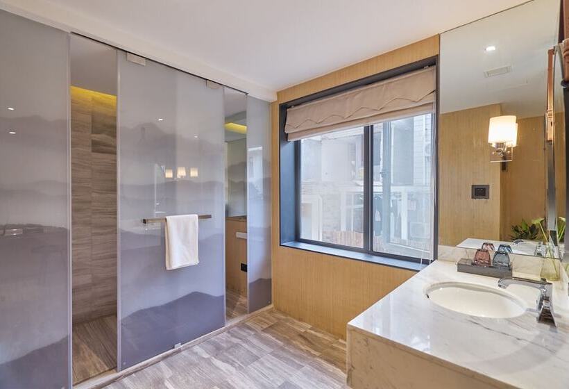 هتل Wuhua Xingxiang Shanfang