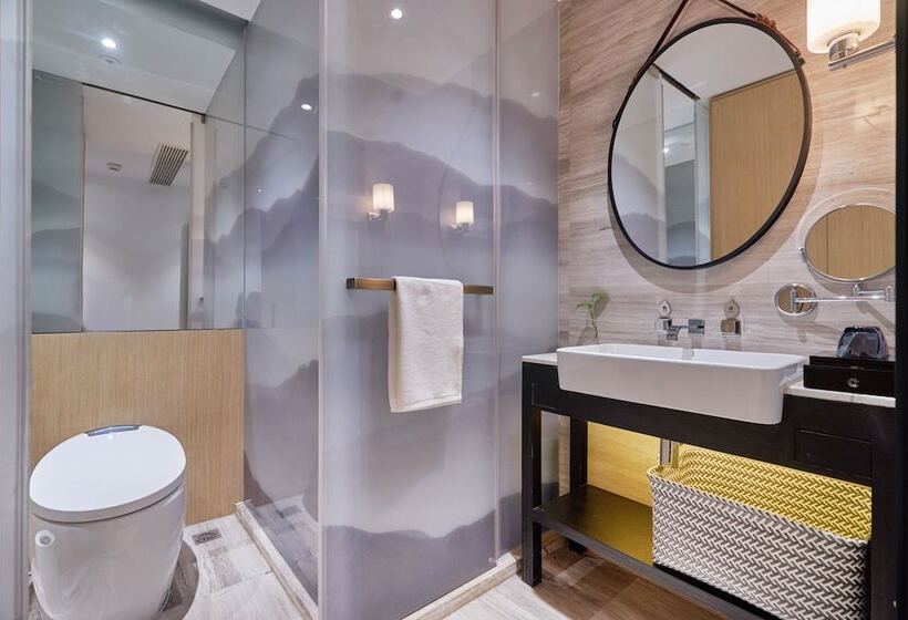 هتل Wuhua Xingxiang Shanfang