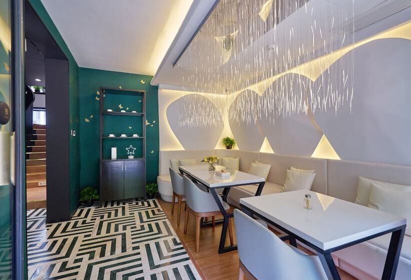 هتل Wuhua Xingxiang Shanfang