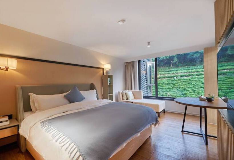 هتل Wuhua Xingxiang Shanfang