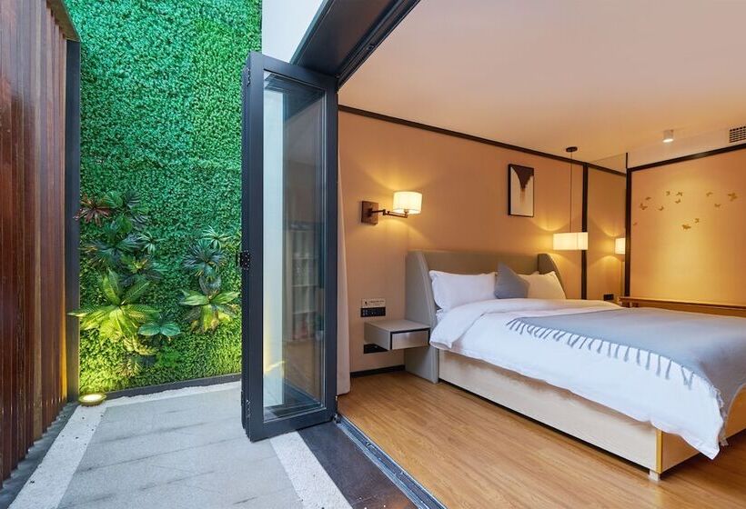 هتل Wuhua Xingxiang Shanfang