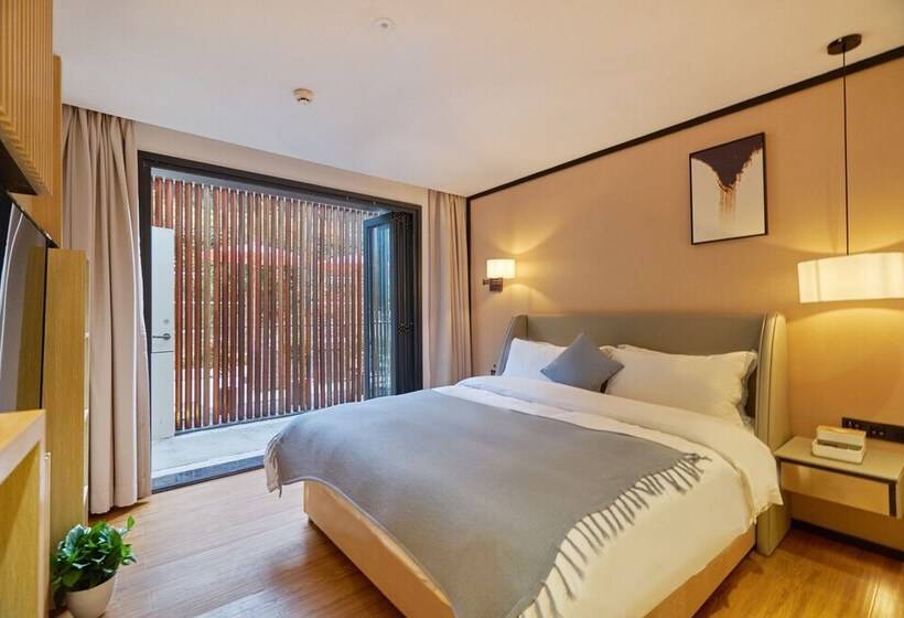 هتل Wuhua Xingxiang Shanfang