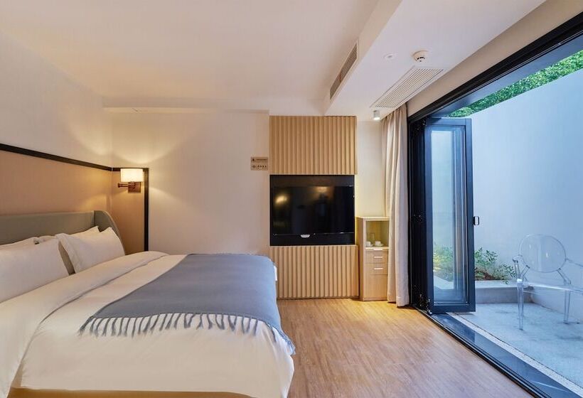 هتل Wuhua Xingxiang Shanfang